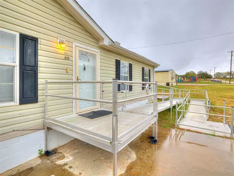 Exterior - 312 E 5th St, Wanette, OK 74878 photo 6 of 9