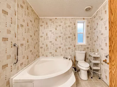 Bath - 312 E 5th St, Wanette, OK 74878 photo 2 of 7