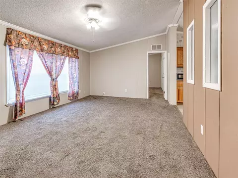 Living - 312 E 5th St, Wanette, OK 74878 photo 1 of 4