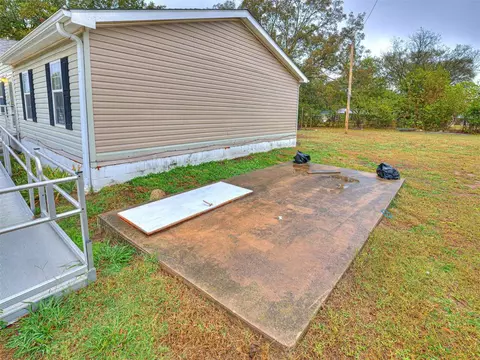 Exterior - 312 E 5th St, Wanette, OK 74878 photo 5 of 9