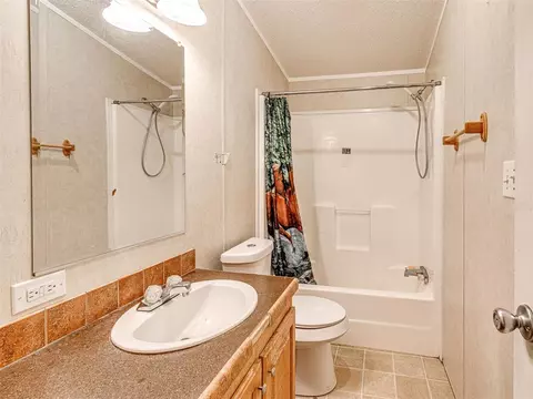 Bath - 312 E 5th St, Wanette, OK 74878 photo 5 of 7