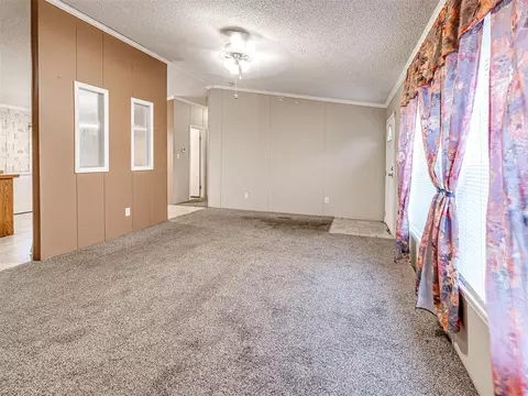 Living - 312 E 5th St, Wanette, OK 74878 photo 3 of 4