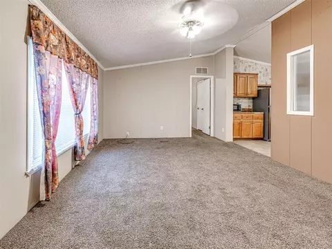 Living - 312 E 5th St, Wanette, OK 74878 photo 2 of 4