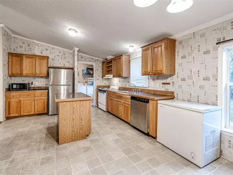 Kitchen - 312 E 5th St, Wanette, OK 74878 photo 3 of 6