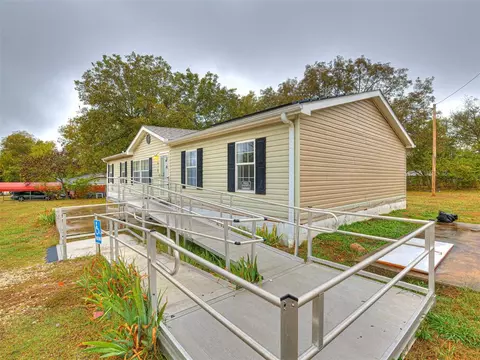 Exterior - 312 E 5th St, Wanette, OK 74878 photo 7 of 9