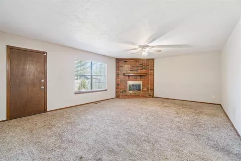 Living - 1105 NE Spruce St, Moore, OK 73160 photo 1 of 4