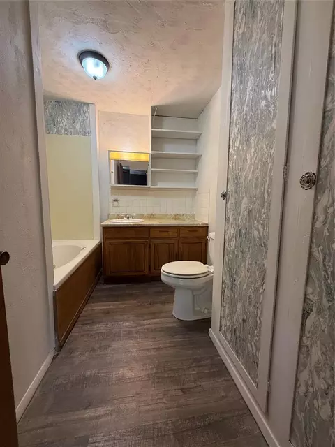 Bath - 311 W 5th St, Broken Bow, OK 74728 photo 1 of 5