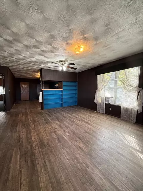 Living - 311 W 5th St, Broken Bow, OK 74728 photo 2 of 6