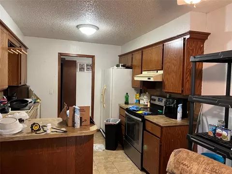 Kitchen - 325 Cherryvale Rd, Edmond, OK 73003 photo 1 of 2