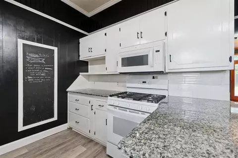 Kitchen - 722 E 2nd St, Chandler, OK 74834 photo 3 of 6