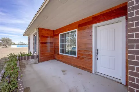 Exterior - 620 Rusty Wayne Dr, Mooreland, OK 73852 photo 4 of 8