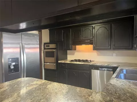 Kitchen - 703 Cedar Ln, Tecumseh, OK 74873 photo 2 of 4