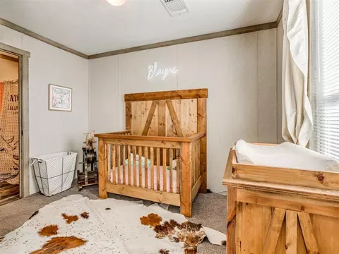 Bedroom - 423972 E 1060 Rd, Checotah, OK 74426 photo 4 of 5