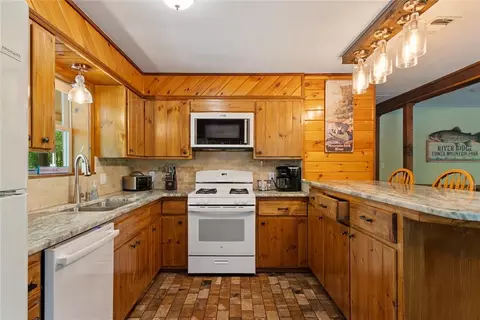 Kitchen - 868 Red Fox Rd, Broken Bow, OK 74728 photo 2 of 3