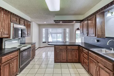 Kitchen - 1609 E Post Oak Rd, Norman, OK 73072 photo 1 of 2