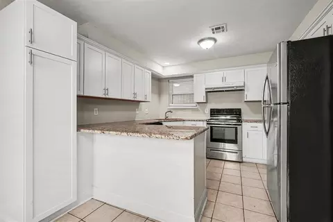 Kitchen - 1104 NE 5th St, Moore, OK 73160 photo 1 of 3