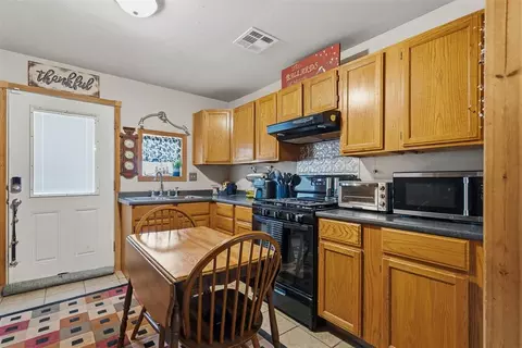 Kitchen - 303 E Main St, Ringling, OK 73456 photo 2 of 3