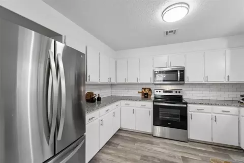 Kitchen - 422 Chartrand Ave, Edmond, OK 73034 photo 1 of 7