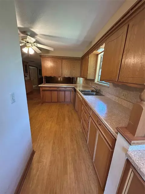 Kitchen - 1600 E Imhoff Rd, Norman, OK 73071 photo 2 of 5
