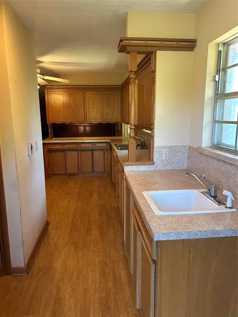 Kitchen - 1600 E Imhoff Rd, Norman, OK 73071 photo 1 of 5