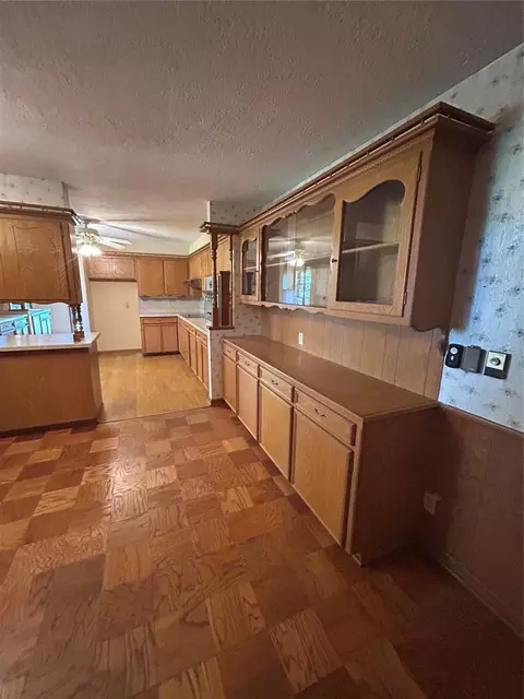 Kitchen - 1600 E Imhoff Rd, Norman, OK 73071 photo 5 of 5