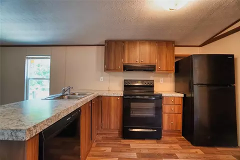 Kitchen - 801 E Oak St, Maud, OK 74854 photo 2 of 3