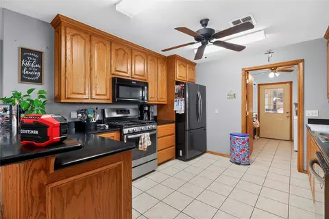 Kitchen - 910 1st St, Elgin, OK 73538 photo 1 of 4