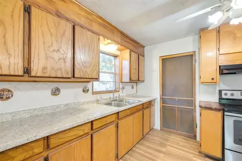 Kitchen - 416888 E 1136 Rd, Checotah, OK 74426 photo 2 of 3