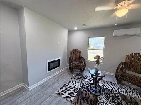 Living - 303 N 8th St, Comanche, OK 73529 photo 2 of 2