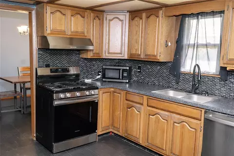 Kitchen - 317 W 4th St, Erick, OK 73645 photo 3 of 3