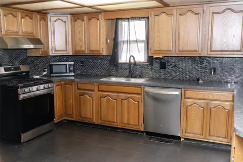 Kitchen - 317 W 4th St, Erick, OK 73645 photo 2 of 3