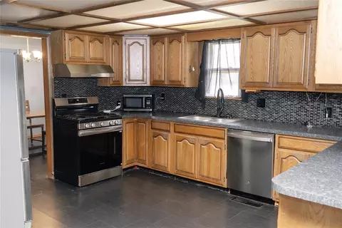 Kitchen - 317 W 4th St, Erick, OK 73645 photo 1 of 3