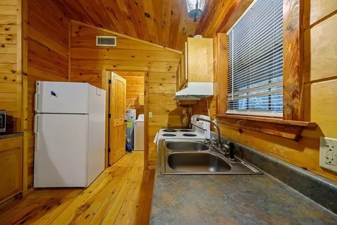 Kitchen - 657 Canoe Rd, Broken Bow, OK 74728 photo 2 of 3