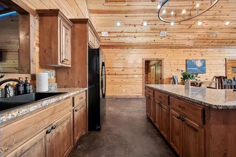 Kitchen - 132 Bass Loop Rd, Broken Bow, OK 74728 photo 3 of 4
