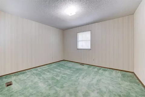 Bedroom - 332852 E 1060 Rd, Mcloud, OK 74851 photo 8 of 9
