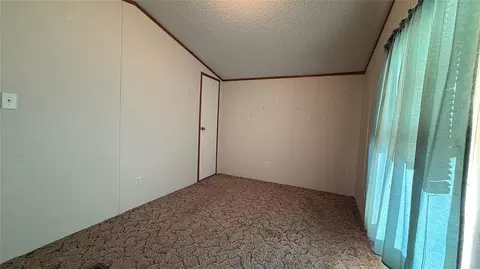 Bedroom - 3000 E Walnut St, Tecumseh, OK 74873 photo 5 of 7