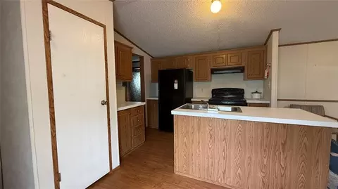 Kitchen - 3000 E Walnut St, Tecumseh, OK 74873 photo 2 of 3