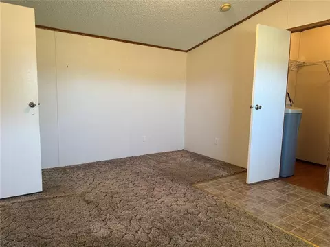 Bedroom - 3000 E Walnut St, Tecumseh, OK 74873 photo 1 of 7