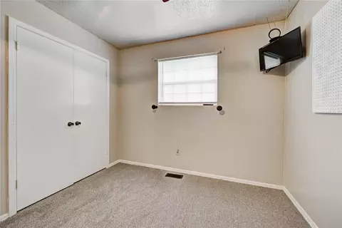 Bedroom - 202 E Cherry Ave, Yukon, OK 73099 photo 8 of 9