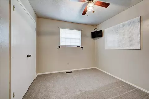 Bedroom - 202 E Cherry Ave, Yukon, OK 73099 photo 7 of 9