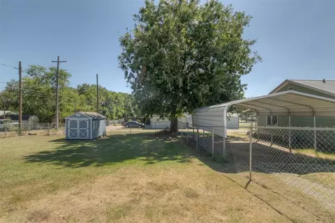 Exterior - 216 SW 4th St, Checotah, OK 74426 photo 4 of 9