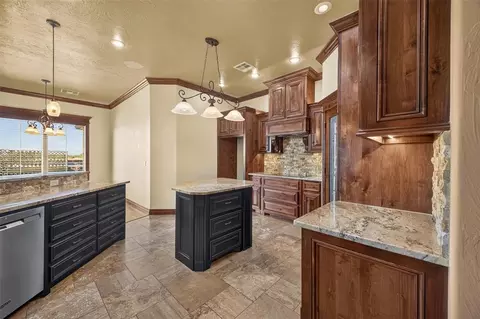 Kitchen - 608 Edgewood Rd St, Canute, OK 73626 photo 2 of 4