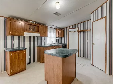Kitchen - 8990 E Tecumseh Rd, Norman, OK 73026 photo 2 of 2