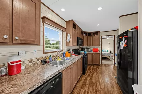 Kitchen - 320 E 10th St, Okemah, OK 74859 photo 2 of 4