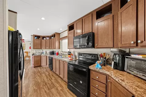 Kitchen - 320 E 10th St, Okemah, OK 74859 photo 1 of 4