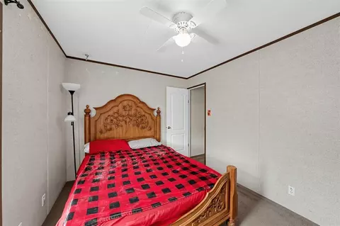 Bedroom - 320 E 10th St, Okemah, OK 74859 photo 2 of 7