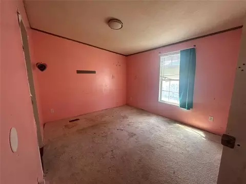 Bedroom - 202 S Cedar Ave, Erick, OK 73645 photo 4 of 5