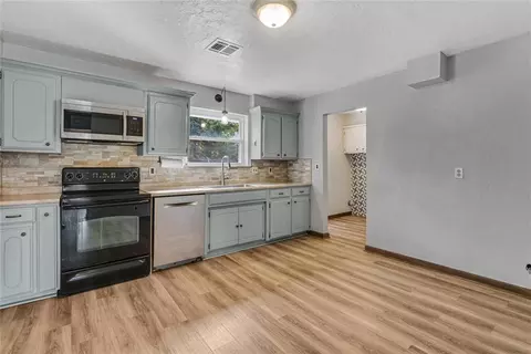 Kitchen - 324 E Carson Ln, Mustang, OK 73064 photo 1 of 2