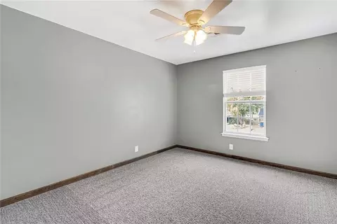 Bedroom - 324 E Carson Ln, Mustang, OK 73064 photo 4 of 8