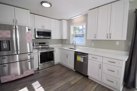 Kitchen - 715 Pine Dr N #A, Surfside Beach, SC 29575 photo 5 of 5